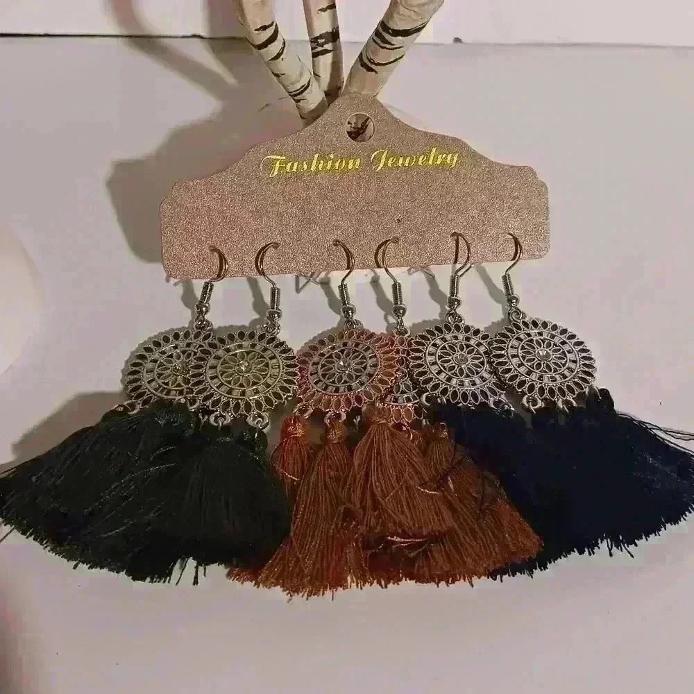 Three pair of round flower earrings. - Picture 2 of 3